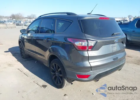 2017 Ford Escape Titanium z USA, uszkodzony, nr VIN 1FMCU0J91HUE85232